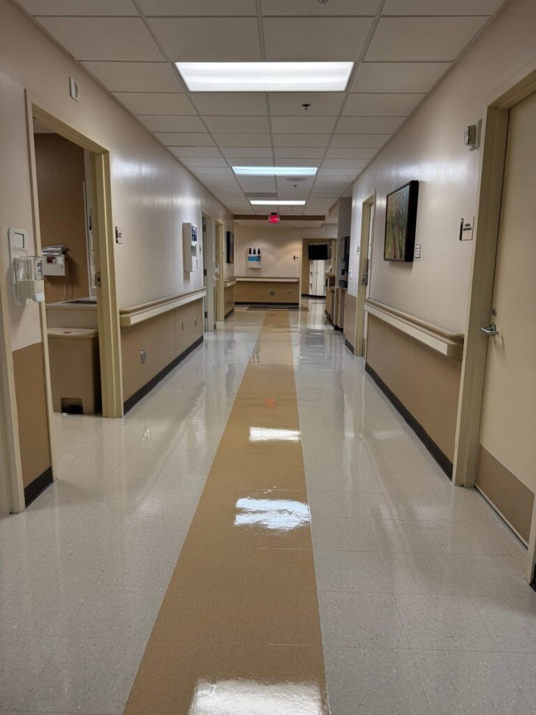 Freshly waxed hospital hallway floor